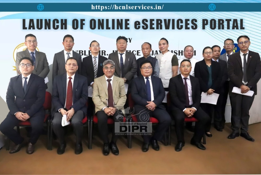 Justice Vijay Bishnoi, Chief Justice of Gauhati High Court (sitting 3rd from left) Justice Lanusungkum Jamir (4th from left) & Justice Devashis Baruah (2nd from left), Judges of Gauhati High Court with registry officials at the launch of online eservices portal.